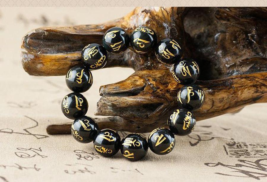 Bracelet fantaisie boules d'onyx noire mat et perle d'argent tressé